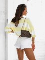 Damski sweter oversize w pasy Cocomore żółty
